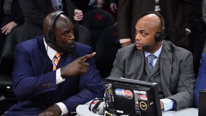 Feb 16, 2013; Houston, TX, USA; TNT broadcaster Shaquille O'Neal (left) and Charles Barkley talk during the 2013 NBA All-Star slam dunk contest at the Toyota Center. Mandatory Credit: Bob Donnan-USA TODAY Sports