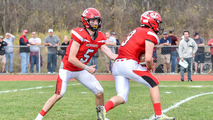CVU's quarterback, Ollie Cheer hands the ball to Jack Sumner during the Redhawks' D1 football semifinal vs the Essex Hornets on Saturday afternoon in Hinesburg
D1 Football Semifinal Essex At Cvu 05nov22 9004 CVU's quarterback, Ollie Cheer hands the ball to Jack Sumner during the Redhawks' D1 football semifinal vs the Essex Hornets on Saturday afternoon in Hinesburg
D1 Football Semifinal Essex At Cvu 05nov22 9004