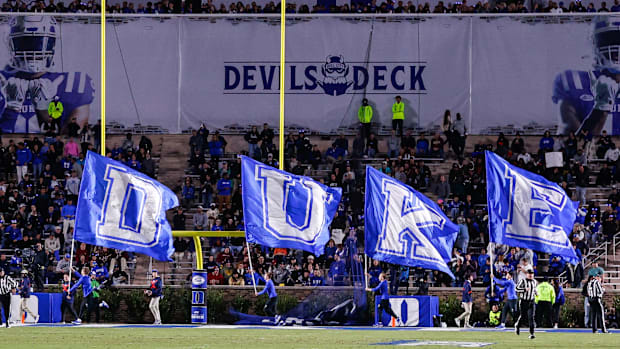 DUKE flags during a football gam