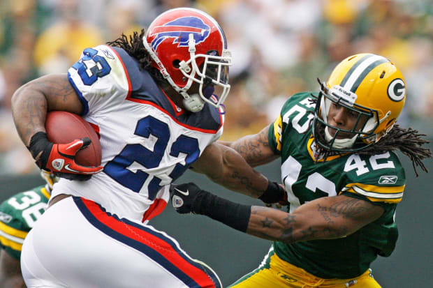 Buffalo Bills Marshawn Lynch breaks an attempted tackle by Green Bay Packers safety Morgan Burnett during the first quarter.