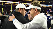Mississippi State Bulldogs head coach Jeff Lebby and Mississippi Rebels head coach Lane Kiffin shake hands after the game at Vaught-Hemingway Stadium.