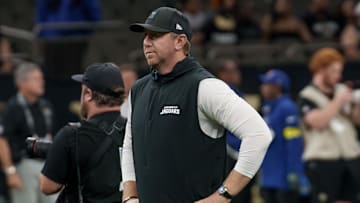 Aug 17, 2025; New Orleans, Louisiana, USA; Jacksonville Jaguars head coach Liam Coen warms up before a game against the New Orleans Saints at Caesars Superdome. 