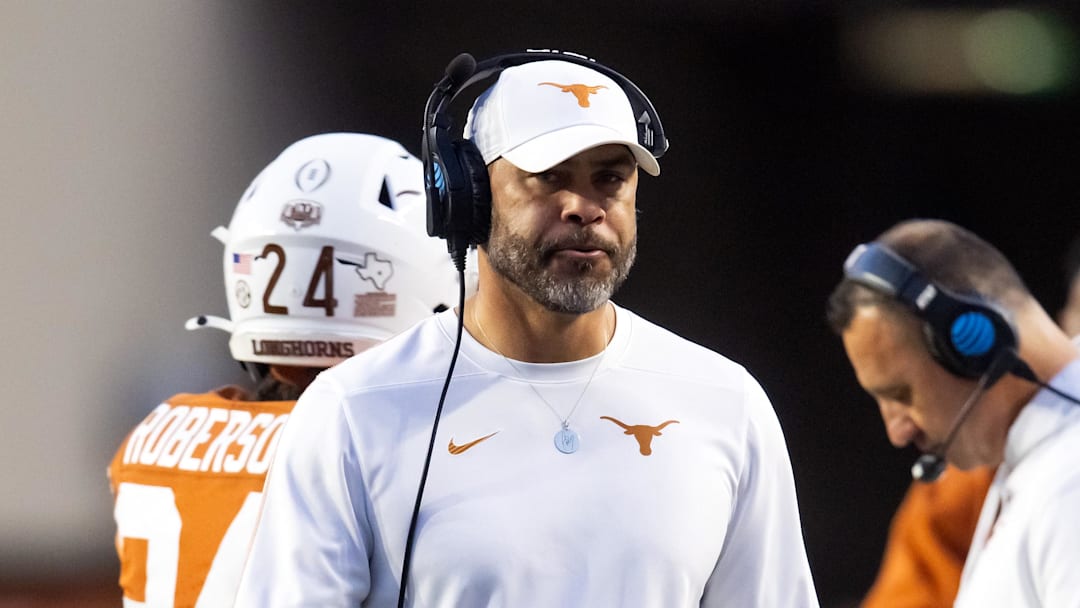 Dec 21, 2024; Austin, Texas, USA; Texas Longhorns wide receivers coach Chris Jackson against the Clemson Tigers during the CFP National playoff first round at Darrell K Royal-Texas Memorial Stadium. Mandatory Credit: Mark J. Rebilas-Imagn Images Dec 21, 2024; Austin, Texas, USA; Texas Longhorns wide receivers coach Chris Jackson against the Clemson Tigers during the CFP National playoff first round at Darrell K Royal-Texas Memorial Stadium. Mandatory Credit: Mark J. Rebilas-Imagn Images