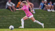 Tennessee midfielder Mac Midgley (20) dribbles the ball during a NCAA soccer game between Tennessee and Georgia at Regal Soccer Stadium in Knoxville, Tennessee on October 2, 2025.