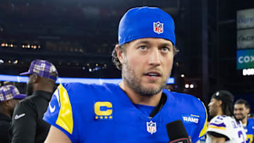 Jan 13, 2025; Glendale, AZ, USA; Los Angeles Rams quarterback Matthew Stafford (9) against the Minnesota Vikings during an NFC wild card game at State Farm Stadium. Mandatory Credit: Mark J. Rebilas-Imagn Images