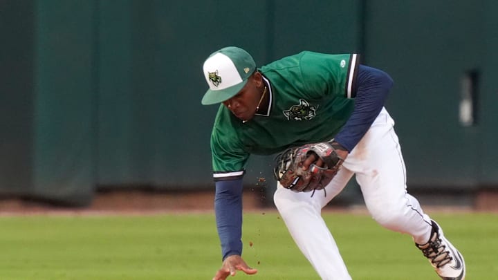 June 4, 2025; North Augusta, South Carolina, USA; Augusta GreenJacket infielder John Gil (7) reaches for the ball during the second game of the Augusta GreenJacket and Fayetteville series at SRP Park. Mandatory Credit: Katie Goodale - Augusta Chronicle/USA TODAY NETWORK