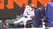 Patriots offensive tackle Will Campbell was carted off the field.