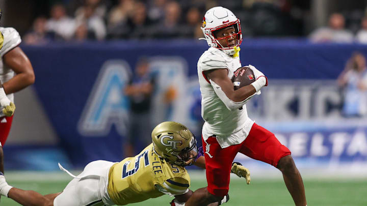 Sep 1, 2023; Atlanta, Georgia, USA; Louisville Cardinals wide receiver Jamari Thrash (1) runs after a catch against the Georgia Tech Yellow Jackets in the fourth quarter at Mercedes-Benz Stadium. Mandatory Credit: Brett Davis-Imagn Images