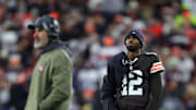 Cleveland Browns quarterback Shedeur Sanders (12) waits for his opportunity as head coach Kevin Stefanski watches Dillon Gabriel lead the offense during the first half of an NFL football game at Huntington Bank Field, Nov. 16, 2025, in Cleveland, Ohio.
