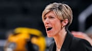 Iowa Hawkeyes head coach Jan Jensen celebrates Thursday, March 6, 2025, in a round two game at the 2025 TIAA Big Ten Women's Basketball Tournament between the Iowa Hawkeyes and the Michigan State Spartans at Gainbridge Fieldhouse in Indianapolis.