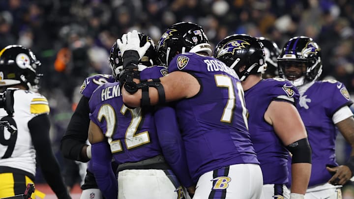 Jan 11, 2025; Baltimore, Maryland, USA; Baltimore Ravens running back Derrick Henry (22) celebrates with offensive tackle Roger Rosengarten (70) and teammates after scoring a touchdown against the Pittsburgh Steelers in the second quarter in an AFC wild card game at M&T Bank Stadium. Mandatory Credit: Geoff Burke-Imagn Images Jan 11, 2025; Baltimore, Maryland, USA; Baltimore Ravens running back Derrick Henry (22) celebrates with offensive tackle Roger Rosengarten (70) and teammates after scoring a touchdown against the Pittsburgh Steelers in the second quarter in an AFC wild card game at M&T Bank Stadium. Mandatory Credit: Geoff Burke-Imagn Images