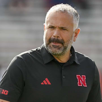 Nebraska coach Matt Rhule reportedly has signed a three-year contract extension to stay with the Huskers.