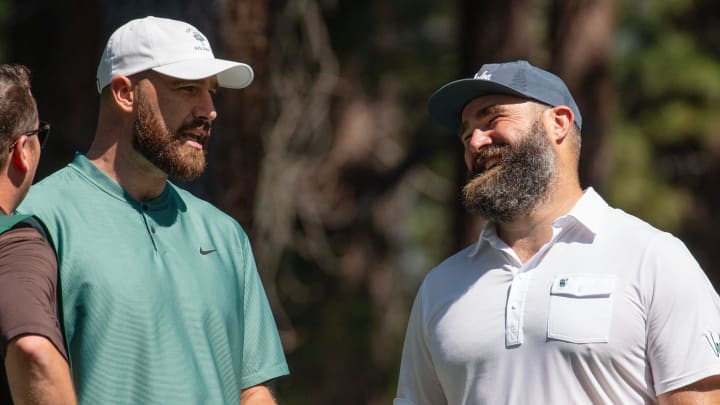 Travis Kelce and brother Jason Kelce talk on the 4th tee during the first round of the American Century Celebrity Championship golf tournament at Edgewood Tahoe Golf Course in Stateline, Nev., Friday, July 12, 2024.