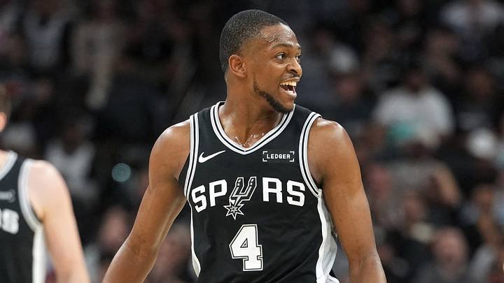 Mar 5, 2026; San Antonio, Texas, USA; San Antonio Spurs guard De’Aaron Fox (4) reacts after scoring a three point basket during the first half against the Detroit Pistons at Frost Bank Center. Mandatory Credit: Scott Wachter-Imagn Images