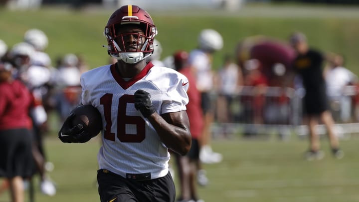 Jul 28, 2023; Ashburn, VA, USA; Washington Commanders wide receiver Byron Pringle (16) runs with the ball after making a catch during drills on day three of Commanders training camp at OrthoVirginia Training Center. Mandatory Credit: Geoff Burke-USA TODAY Sports