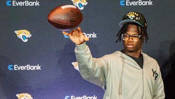 The Jacksonville Jaguars’ first-round pick, Colorado Buffaloes wide receiver and defensive back Travis Hunter, throws a football after a press conference Friday, March 25, 2025 at Miller Electric Center in Jacksonville, Fla. 