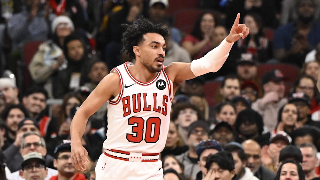 Feb 24, 2026; Chicago, Illinois, USA;  Chicago Bulls guard Tre Jones (30) points after scoring against the Charlotte Hornets during the first half at United Center. Mandatory Credit: Matt Marton-Imagn Images