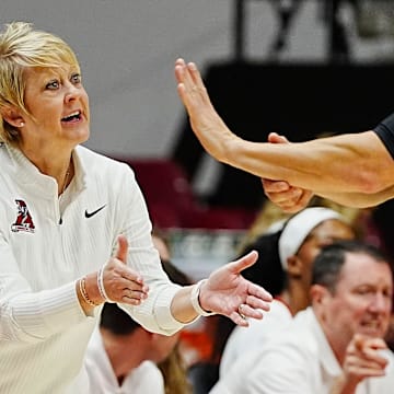 Nov 4, 2024; Tuscaloosa, Alabama,USA; Alabama head coach Kristy Curry lobbies official Travis Jones during the game with New Orleans at Coleman Coliseum.