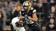 Purdue Boilermakers running back Antonio Harris (22) runs the ball 
