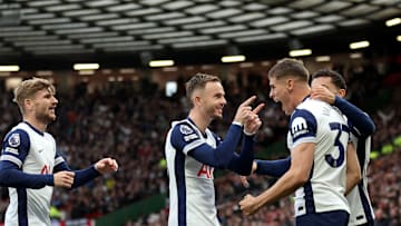 Spurs players celebrating at Old Trafford 