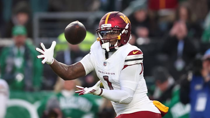 Jan 4, 2026; Philadelphia, Pennsylvania, USA; Washington Commanders wide receiver Deebo Samuel (1) makes a catch during the second quarter against the Philadelphia Eagles at Lincoln Financial Field. Mandatory Credit: Bill Streicher-Imagn Images