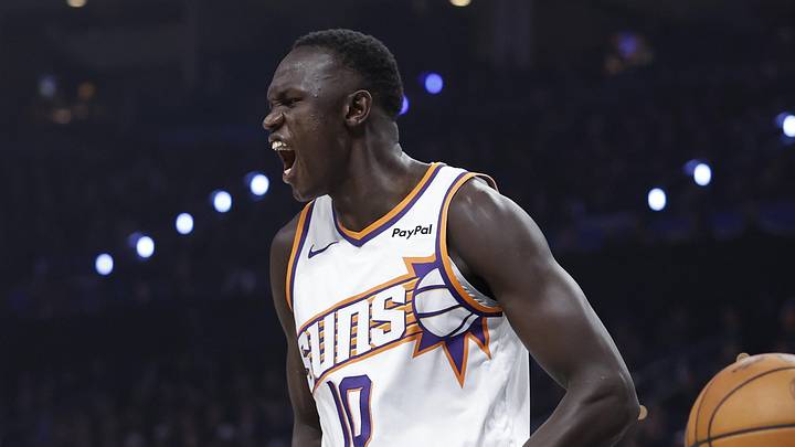 Phoenix Suns center Khaman Maluach screams after dunking against the Oklahoma City Thunder in the first half during game two of the first round of the 2026 NBA Playoffs at Paycom Center.
