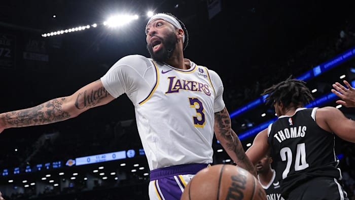 Mar 31, 2024; Brooklyn, New York, USA; Los Angeles Lakers forward Anthony Davis (3) reacts to a call