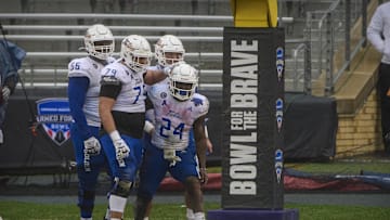 Dec 31, 2020; Fort Worth, TX, USA; Tulsa Golden Hurricane quarterback Zach Smith (11) and running back Corey Taylor II (24) and offensive lineman Jaden Muskrat (79) and offensive lineman Tyler Smith (56) celebrate a touchdown against the Mississippi State Bulldogs during the second half at Amon G. Carter Stadium. Mandatory Credit: Jerome Miron-Imagn Images