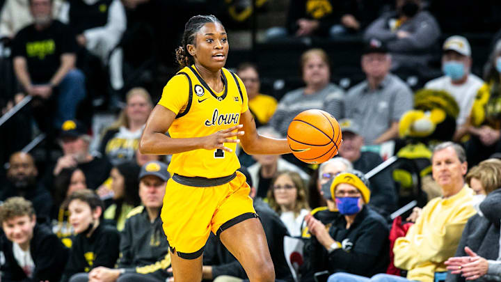 Iowa guard Tomi Taiwo (1) dribbles the ball upcourt during an NCAA Big Ten Conference women's basketball game against Illinois, Sunday, Jan. 23, 2022, at Carver-Hawkeye Arena in Iowa City, Iowa.220123 Illinois Iowa Wbb 016 Jpg