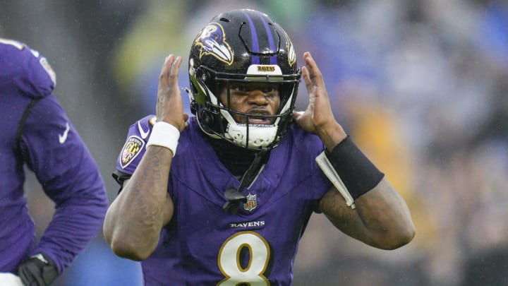 Dec 10, 2023; Baltimore, Maryland, USA;  Baltimore Ravens quarterback Lamar Jackson (8) calls out to teammates before the snap against the Los Angeles Rams during the second quarter at M&T Bank Stadium. Mandatory Credit: Jessica Rapfogel-USA TODAY Sports