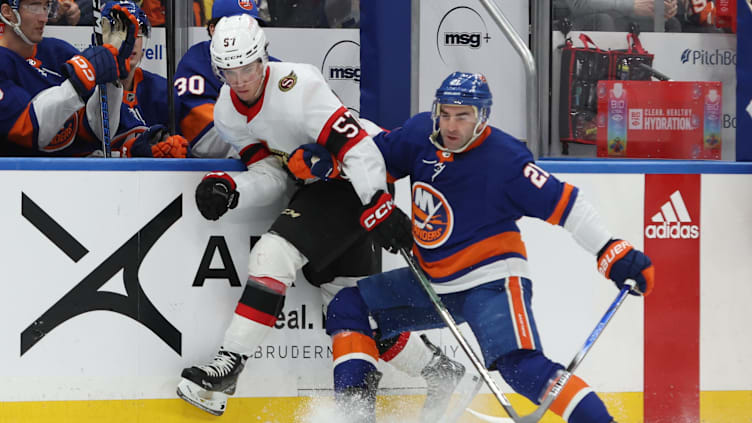 Mar 16, 2024; Elmont, New York, USA;  Ottawa Senators center Shane Pinto (57) and New York Islanders