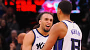 Mar 19, 2025; Sacramento, California, USA; Sacramento Kings guard Devin Carter (22) celebrates with forward Keegan Murray (13) after Murray’s basket against the Cleveland Cavaliers during the third quarter at Golden 1 Center.