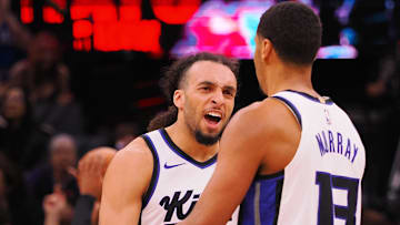 Mar 19, 2025; Sacramento, California, USA; Sacramento Kings guard Devin Carter (22) celebrates with forward Keegan Murray (13) after Murray’s basket against the Cleveland Cavaliers during the third quarter at Golden 1 Center.