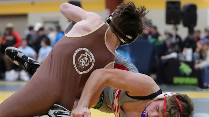 Mount Carmel (Illinois) wrestler Liam Kelly (top) had his perfect season stopped before a ruling this week changed everything. Mount Carmel (Illinois) wrestler Liam Kelly (top) had his perfect season stopped before a ruling this week changed everything.