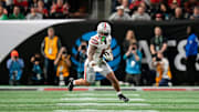 Ohio State Buckeyes wide receiver Brandon Inniss (11) heads up field after a catch against Notre Dame Fighting Irish in the second quarter during the College Football Playoff championship at Mercedes-Benz Stadium in Atlanta on January 20, 2025.
