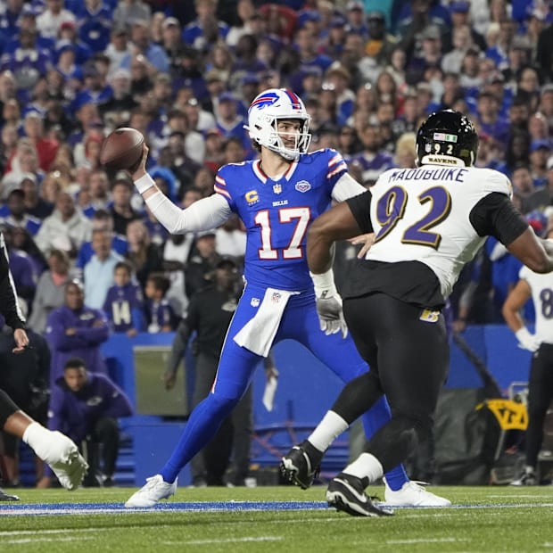 Buffalo Bills quarterback Josh Allen (17) passes the ball during the first quarter against the Baltimore Ravens