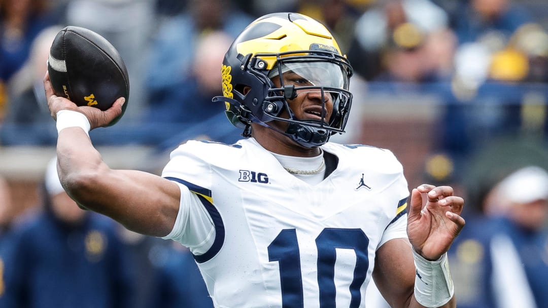 Blue Team quarterback Alex Orji (10) makes a pass against Maize Team during the second half of the spring game at Michigan Stadium in Ann Arbor on Saturday, April 20, 2024.