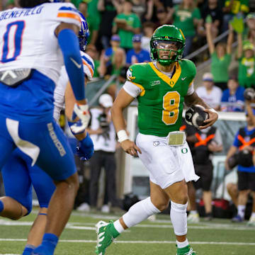 Oregon quarterback Dillon Gabriel carries the ball for a touchdown as the Oregon Ducks host the Boise State Broncos Saturday, Sept. 7, 2024 at Autzen Stadium in Eugene, Ore.