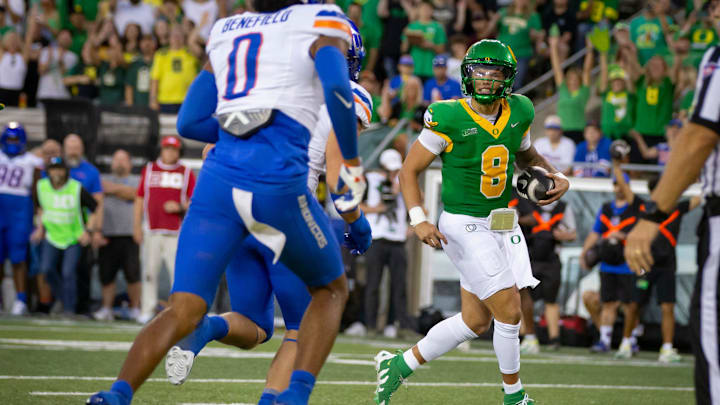 Oregon quarterback Dillon Gabriel carries the ball for a touchdown as the Oregon Ducks host the Boise State Broncos Saturday, Sept. 7, 2024 at Autzen Stadium in Eugene, Ore.