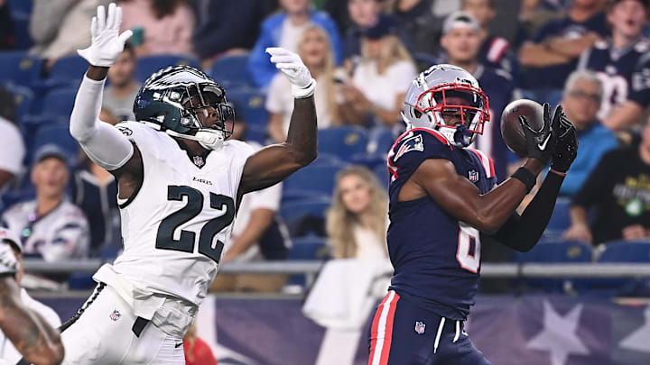 Aug 15, 2024; Foxborough, MA, USA; New England Patriots wide receiver Javon Baker (6) tris to make a catch while being covered by Philadelphia Eagles cornerback Kelee Ringo (22) during the first half at Gillette Stadium. Mandatory Credit: Eric Canha-Imagn Images Aug 15, 2024; Foxborough, MA, USA; New England Patriots wide receiver Javon Baker (6) tris to make a catch while being covered by Philadelphia Eagles cornerback Kelee Ringo (22) during the first half at Gillette Stadium. Mandatory Credit: Eric Canha-Imagn Images