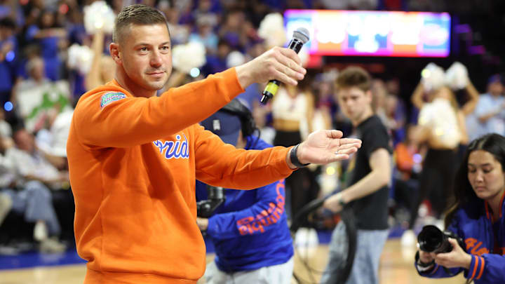 New Gator head football coach Jon Sumrall fires up the crowd during the first half an NCAA basketball game at Steven C. O'Connell Center Exactek arena in Gainesville, FL on Saturday, January 24, 2026. Auburn won 76-67 [Alan Youngblood/Gainesville Sun]