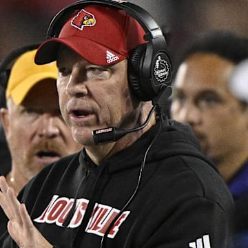 Nov 8, 2025; Louisville, Kentucky, USA;  Louisville Cardinals head coach Jeff Brohm watches from the sideline during the second half against the California Golden Bears at L&N Federal Credit Union Stadium. California defeated Louisville 29-26. Mandatory Credit: Jamie Rhodes-Imagn Images