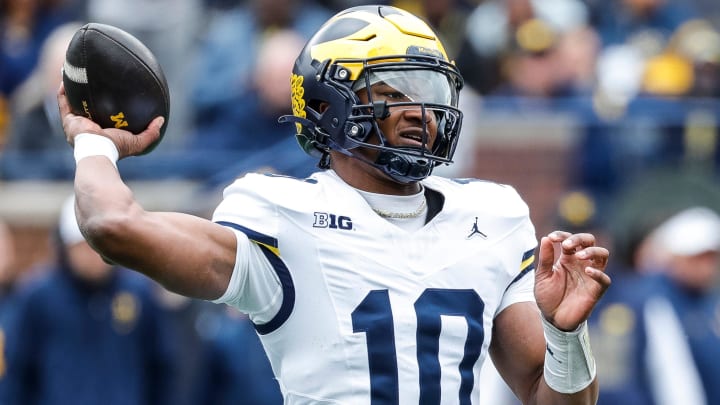 Blue Team quarterback Alex Orji (10) makes a pass against Maize Team during the second half of the spring game at Michigan Stadium in Ann Arbor on Saturday, April 20, 2024.