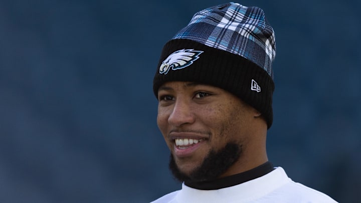 Jan 5, 2025; Philadelphia, Pennsylvania, USA; Philadelphia Eagles running back Saquon Barkley looks on before a game against the New York Giants at Lincoln Financial Field. Mandatory Credit: Bill Streicher-Imagn Images