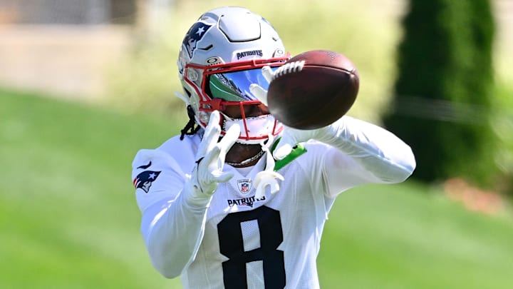 Jul 23, 2025; Foxborough, MA, USA; New England Patriots wide receiver Stefon Diggs (8) makes a catch during training camp at Gillette Stadium. Mandatory Credit: Eric Canha-Imagn Images