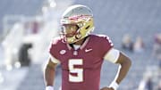 Nov 23, 2024; Tallahassee, Florida, USA; Florida State Seminoles quarterback Trever Jackson (5) warms up before the game against the Charleston Southern Buccaneers at Doak S. Campbell Stadium. Mandatory Credit: Melina Myers-Imagn Images
