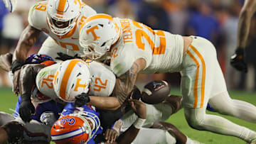 Florida quarterback DJ Lagway (2) gets sacked Tennessee defensive lineman Tyre West (42) and coughs up the ball during the second half of an NCAA football game against Tennessee at Steve Spurrier Field at Ben Hill Griffin Stadium in Gainesville, FL on Saturday, November 22, 2025. Florida lost to Tennessee 31-11[Alan Youngblood/Gainesville Sun]