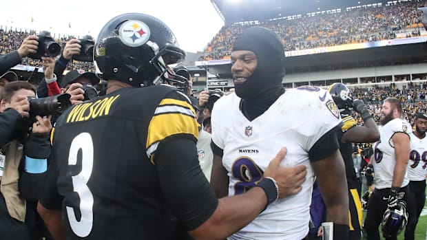 Pittsburgh Steelers quarterback Russell Wilson and Baltimore Ravens quarterback Lamar Jackson