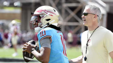 Apr 20, 2024; Tallahassee, Florida, USA; Florida State Seminoles quarterback Trever Jackson (10) and head coach Mike Norvell during the Spring Showcase at Doak S. Campbell Stadium. Mandatory Credit: Melina Myers-USA TODAY Sports