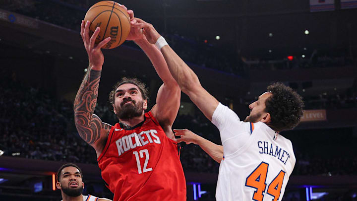  Houston Rockets center Steven Adams (12) rebounds against New York Knicks guard Landry Shamet (44) during the first half at Madison Square Garden.